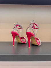 Silver sandals on a thin heel