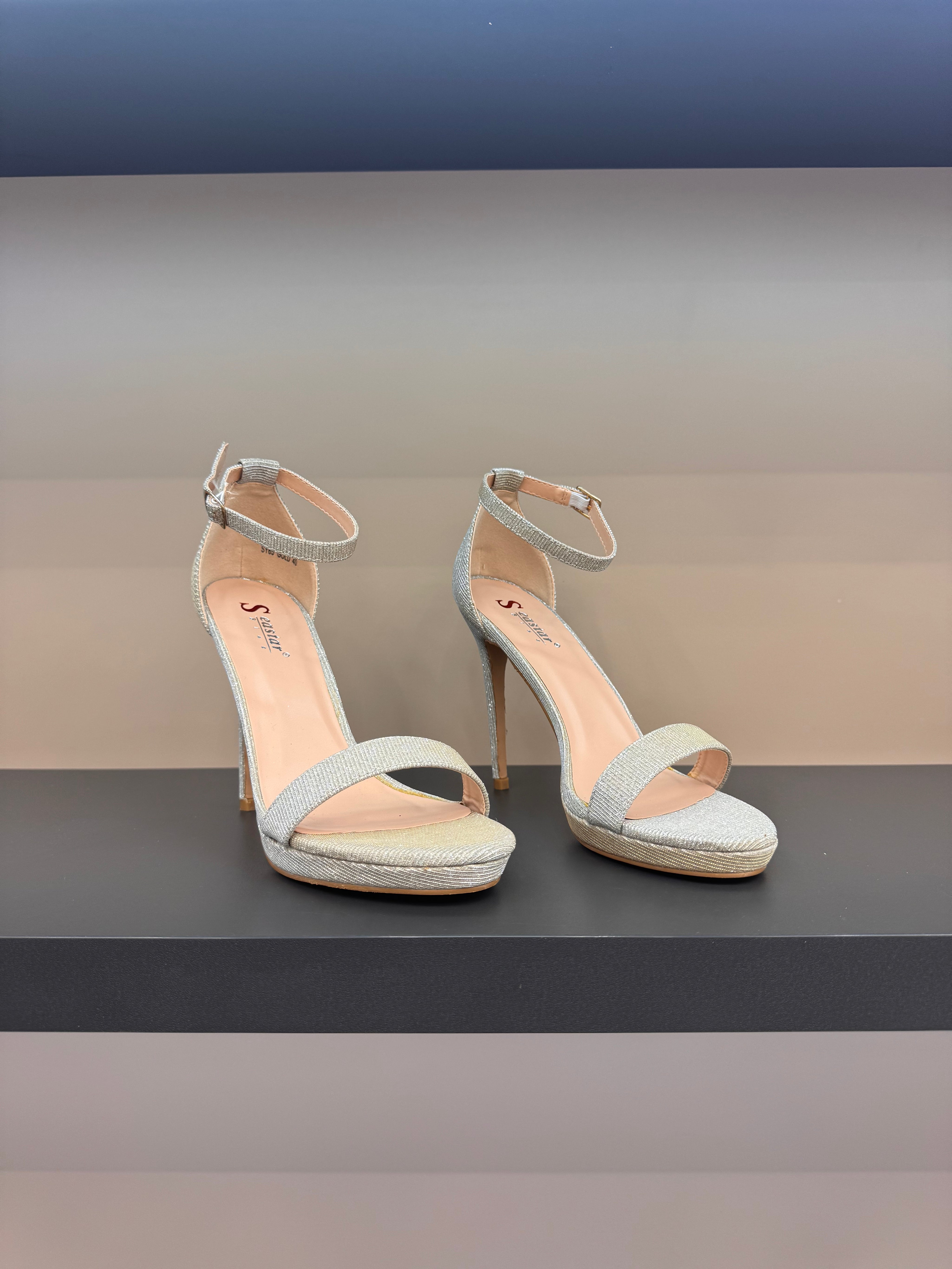 Champagne sandals with thin heels