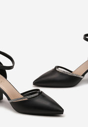 Gold sandals on a thin heel