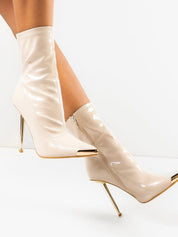 Beige low boots on a thin heel
