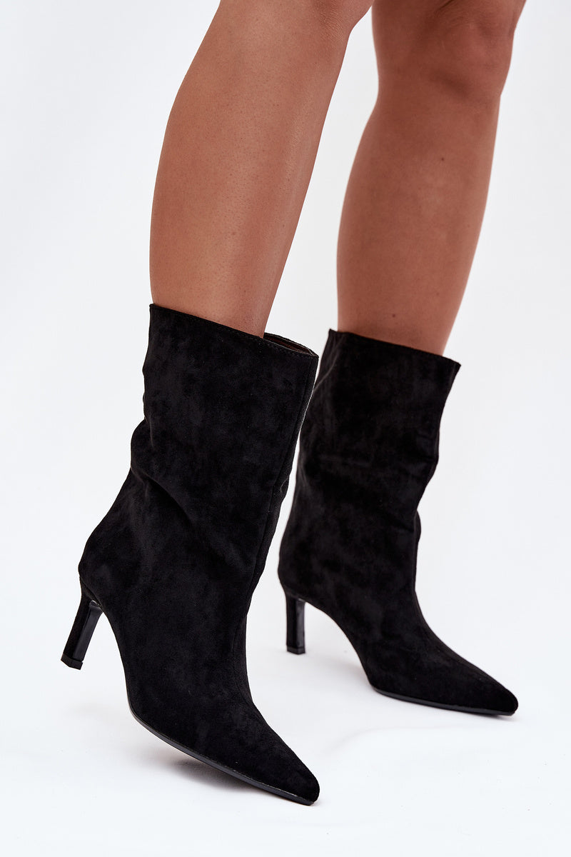 Black boots on a thin heel