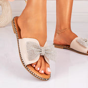 Beige flat slippers