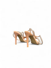 Silver sandals on a thin heel