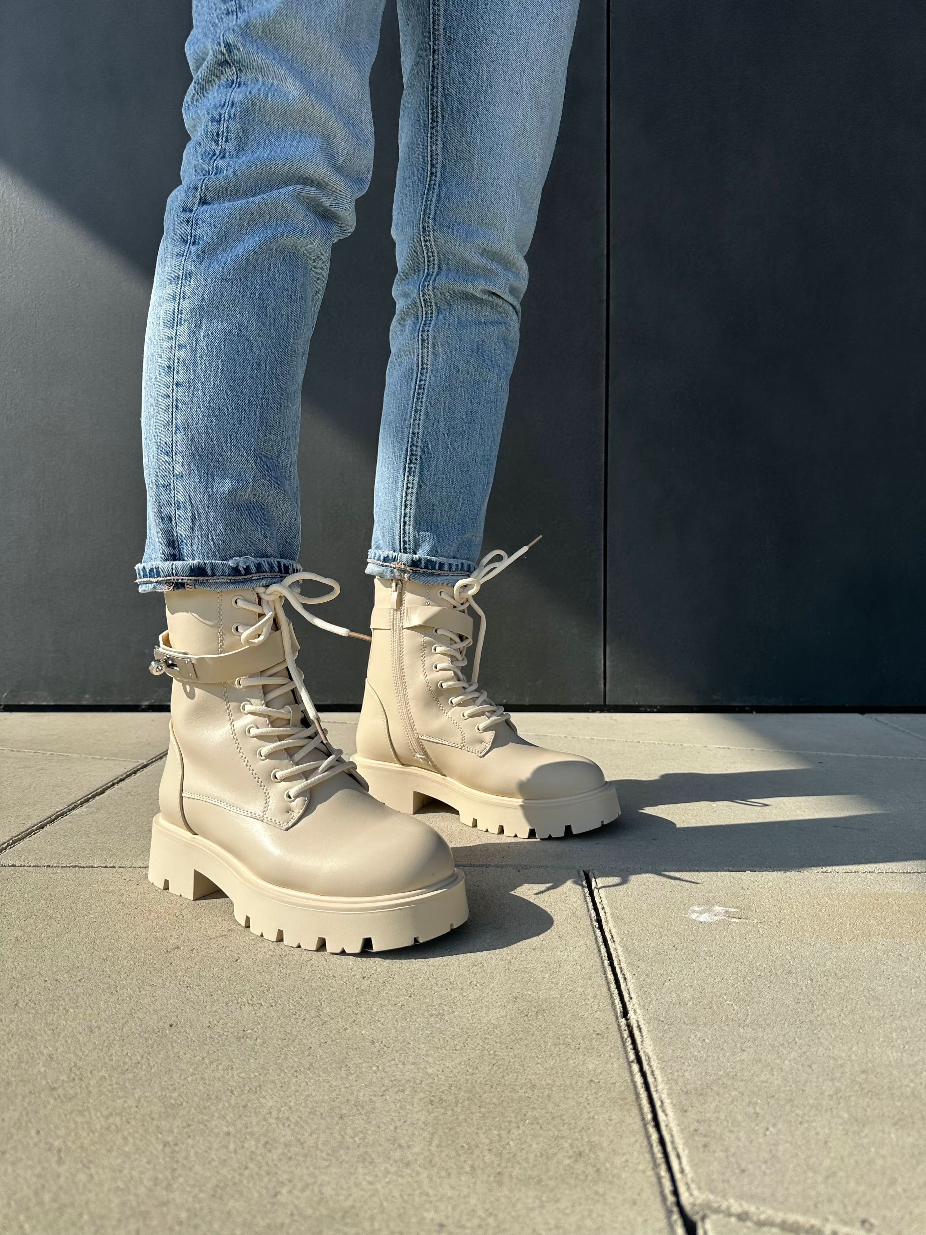 Beige ankle boots with strap