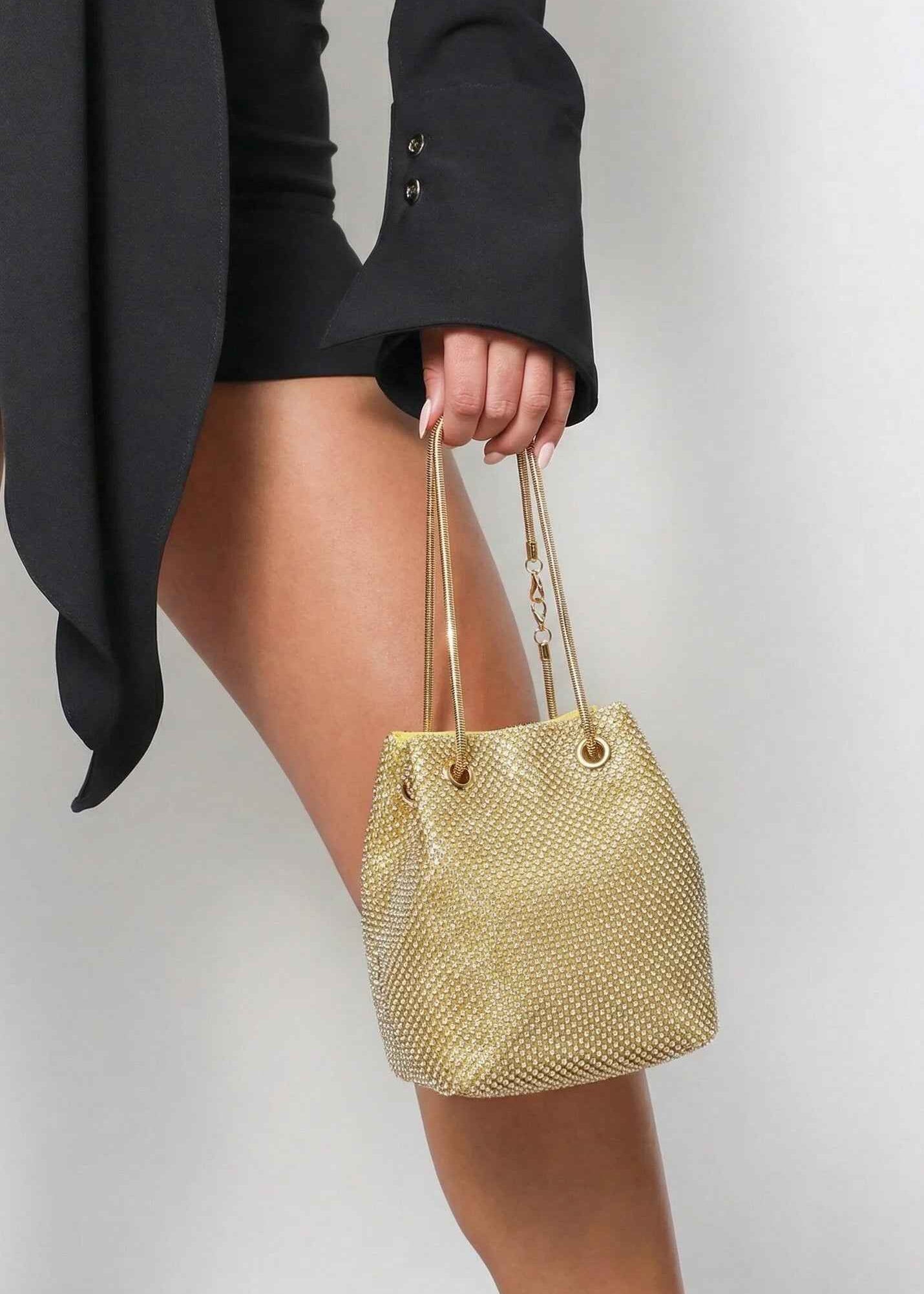 Zlatna šljokičasta večernja torbica