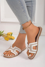 White flat slippers