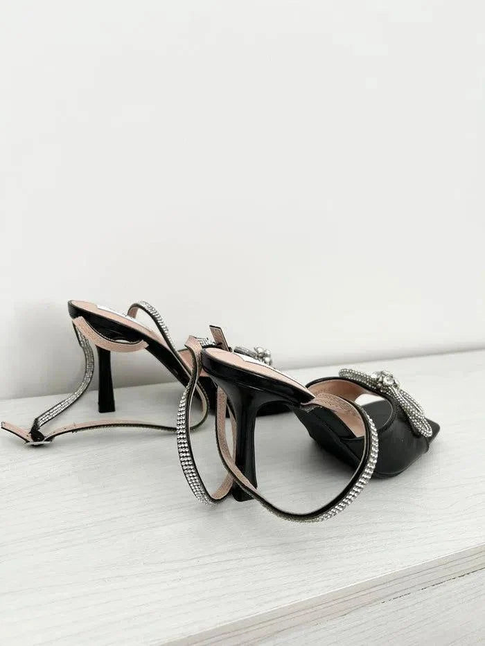 Black sandals with thin heels