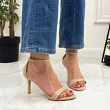 Beige sandals on a thin heel