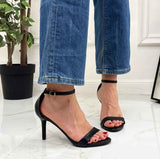 Black sandals with thin heels