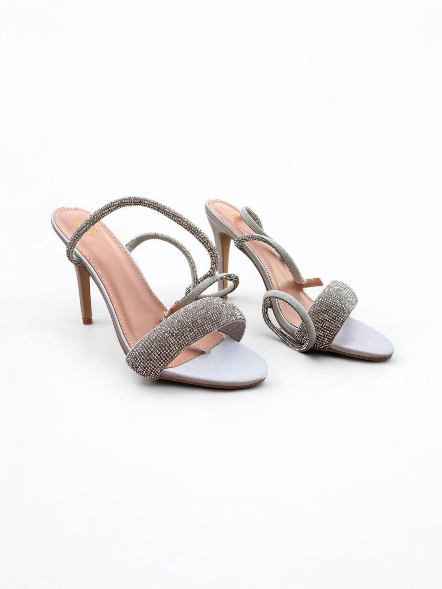 Silver sandals on a thin heel