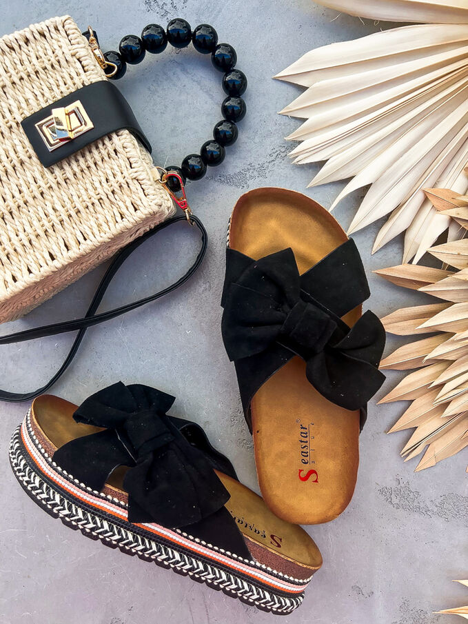 Black flat shoes with a platform