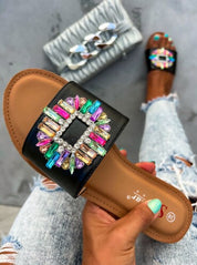 Black flat slippers