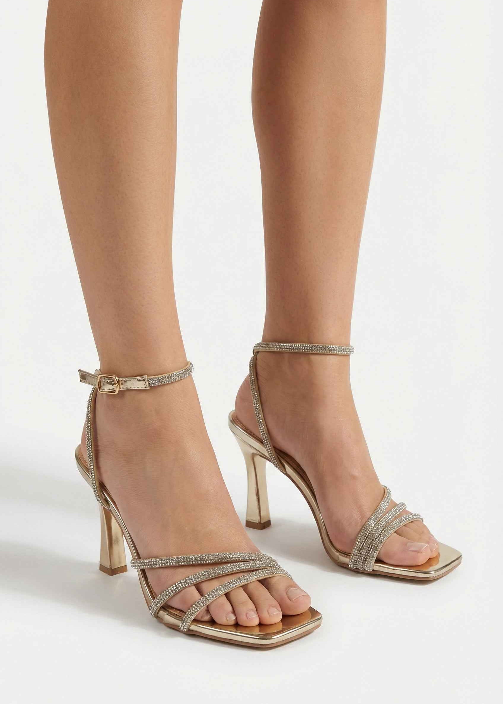 Zlatne sandale na tanku petu