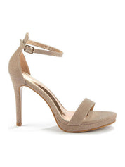 Gold sandals on a thin heel