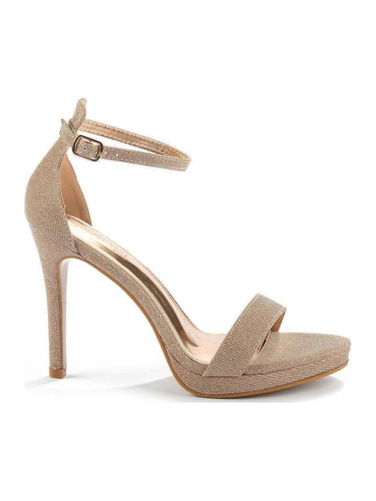 Gold sandals on a thin heel