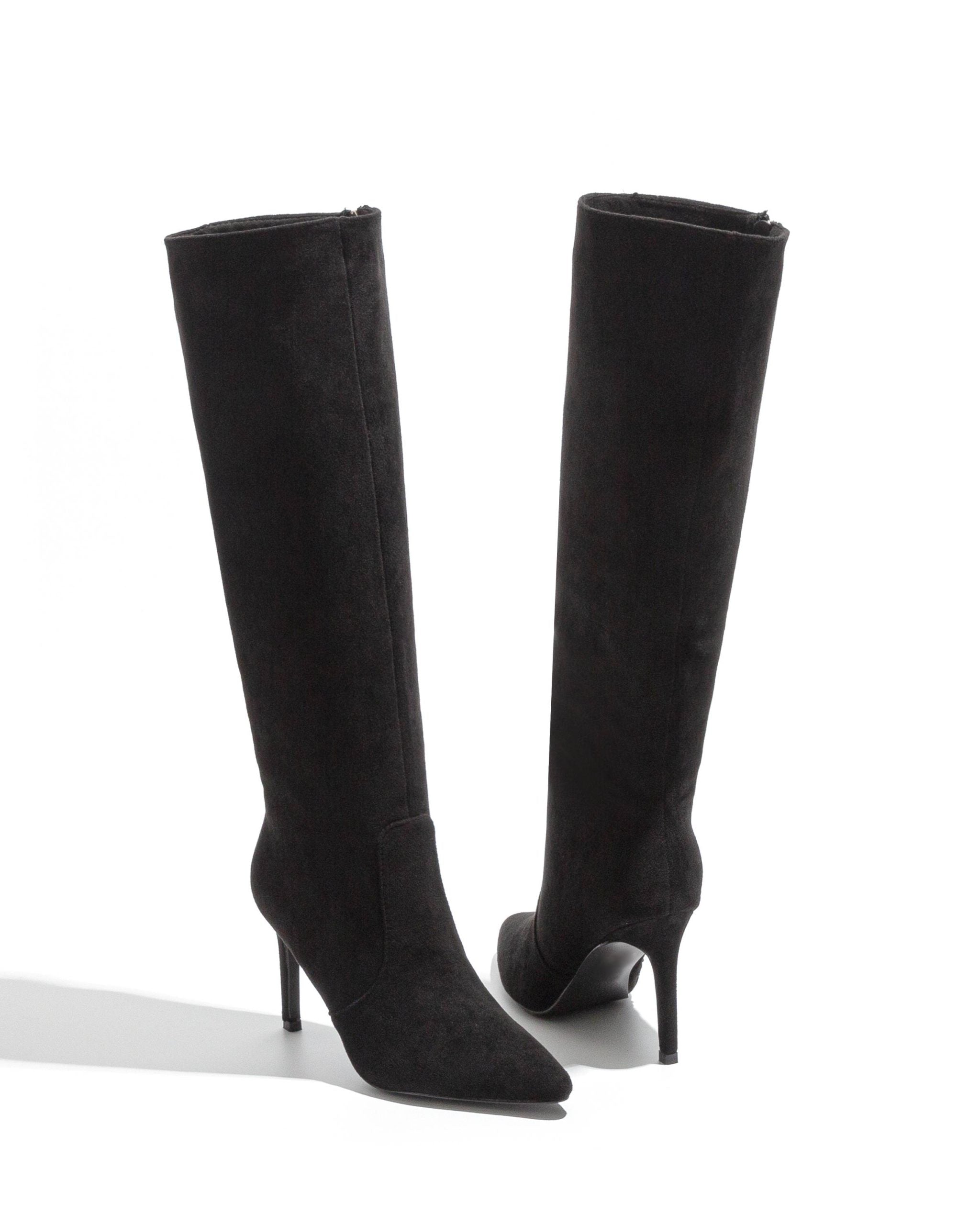 Black polished boots with a thin heel