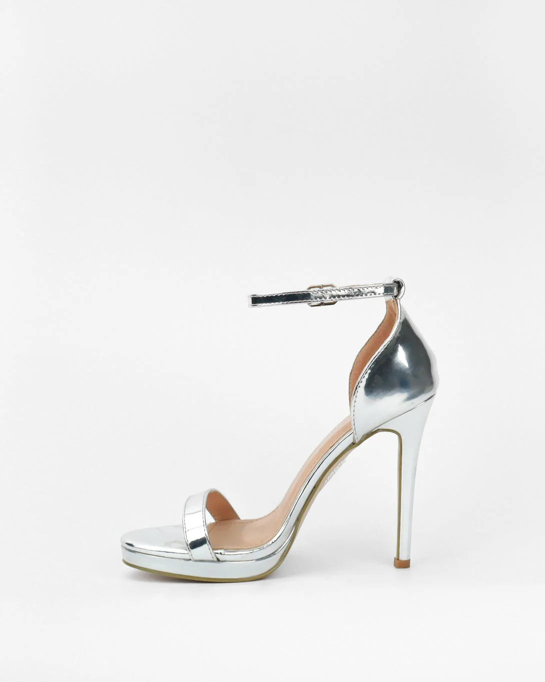 Silver sandals on a thin heel