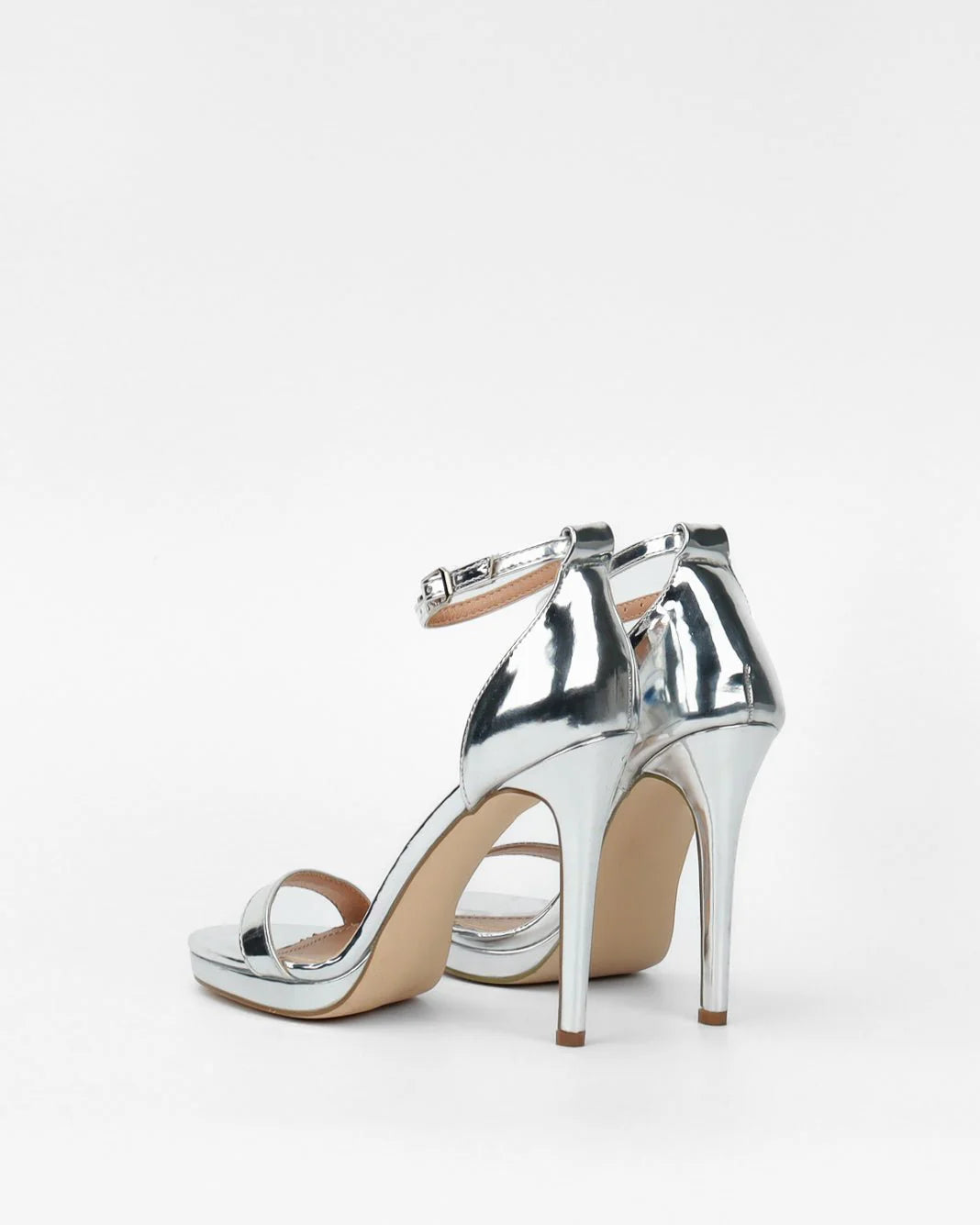 Silver sandals on a thin heel