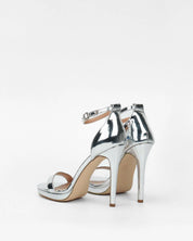 Silver sandals on a thin heel