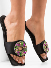 Black flat slippers