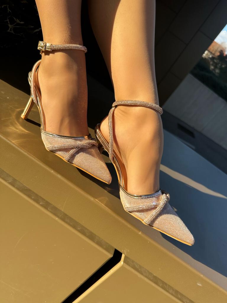 Champagne stilettos with a thin heel