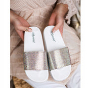 White flat slippers
