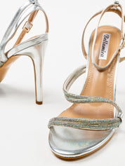 Silver sandals on a thin heel