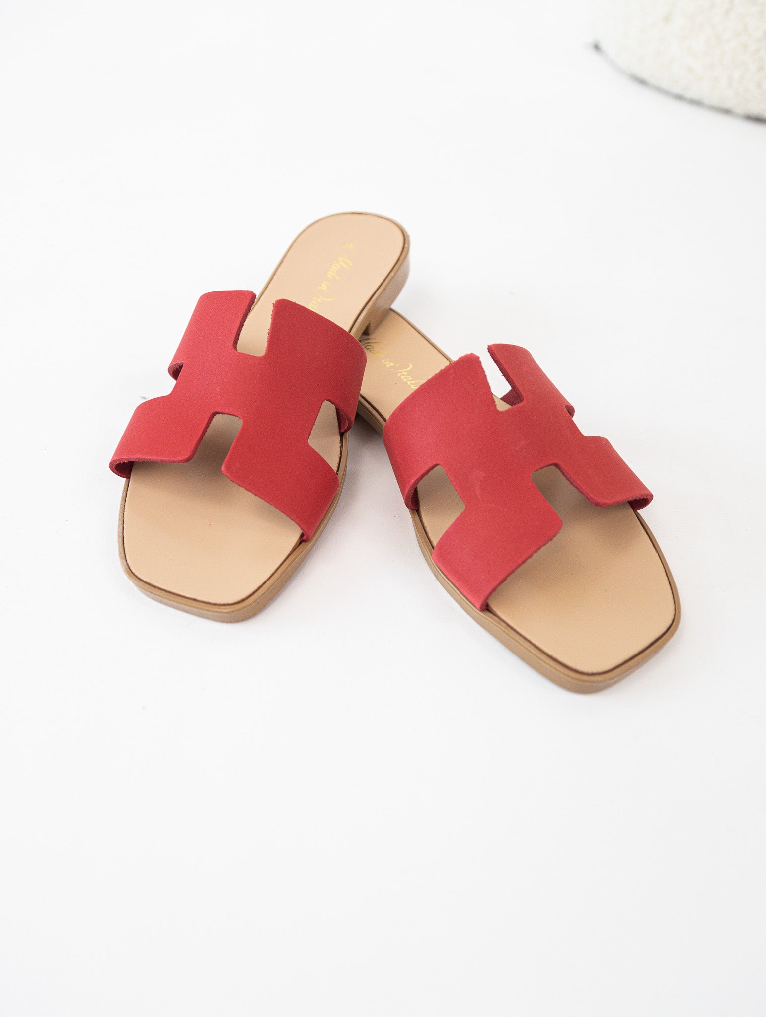 Red genuine leather slippers