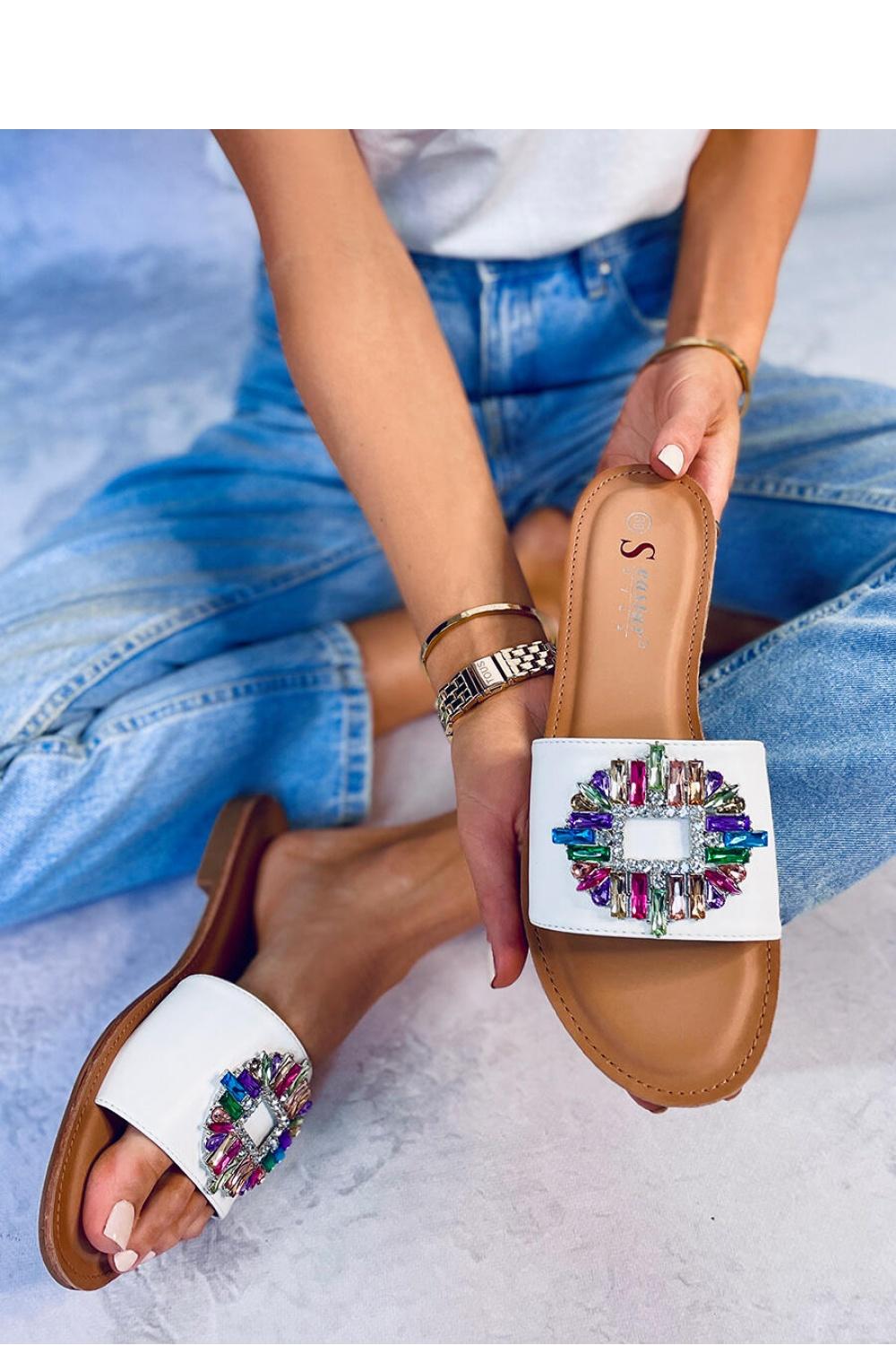 White flat slippers