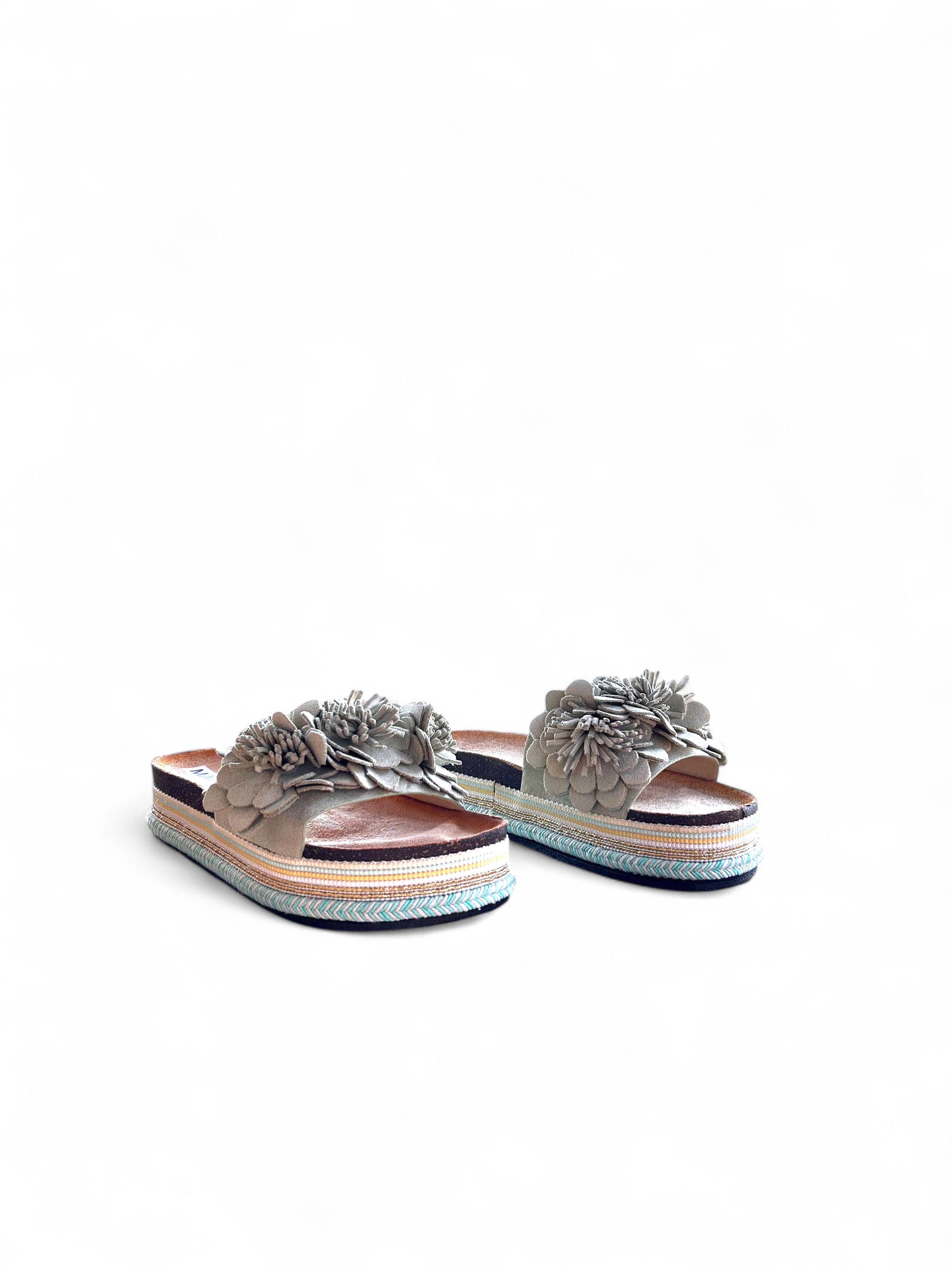 Pink flat shoes with a platform