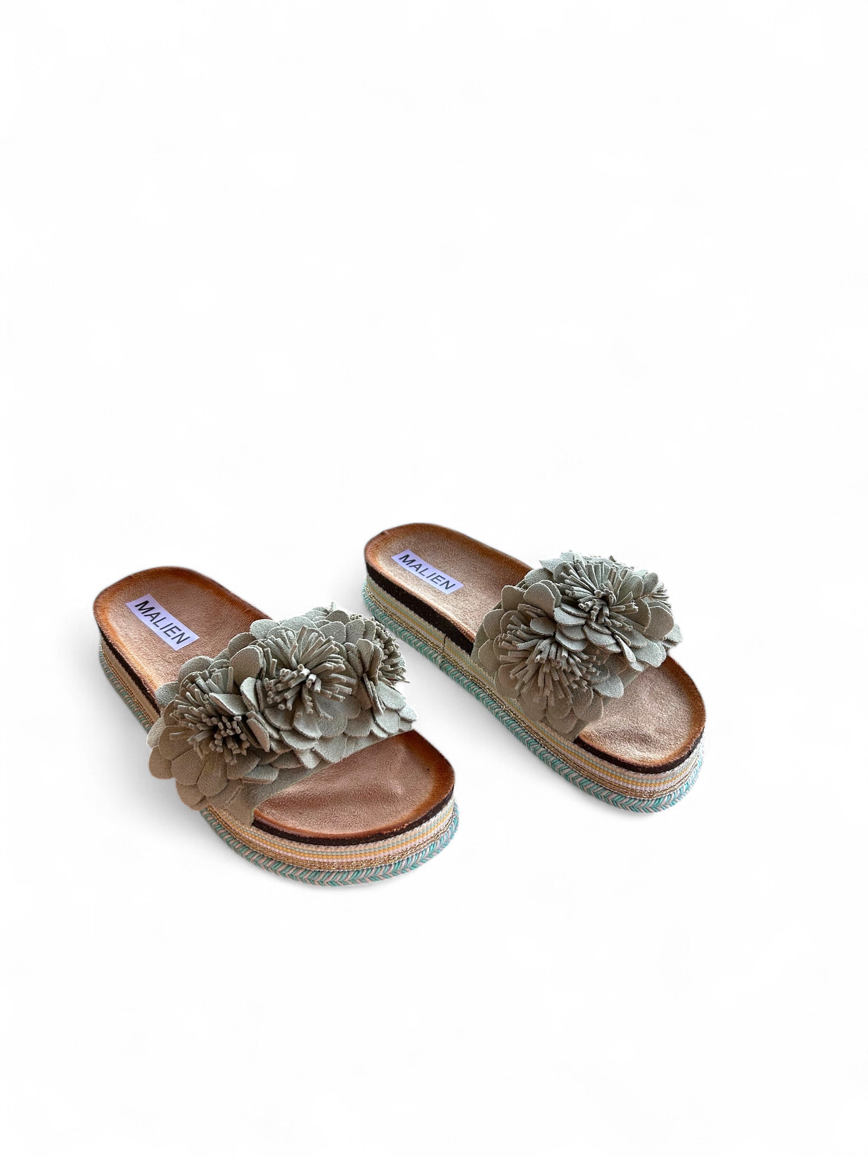 Pink flat shoes with a platform