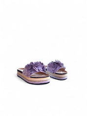 Pink flat shoes with a platform