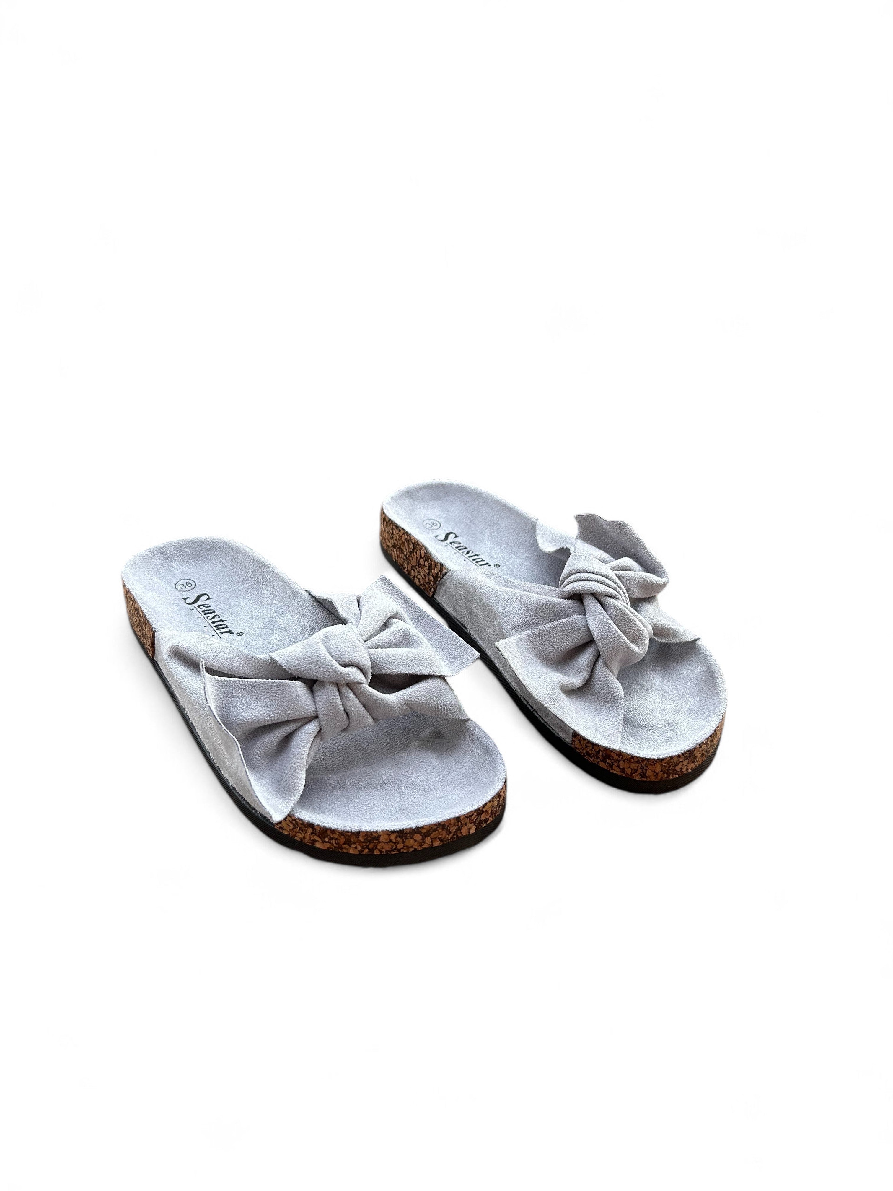Pink flat slippers