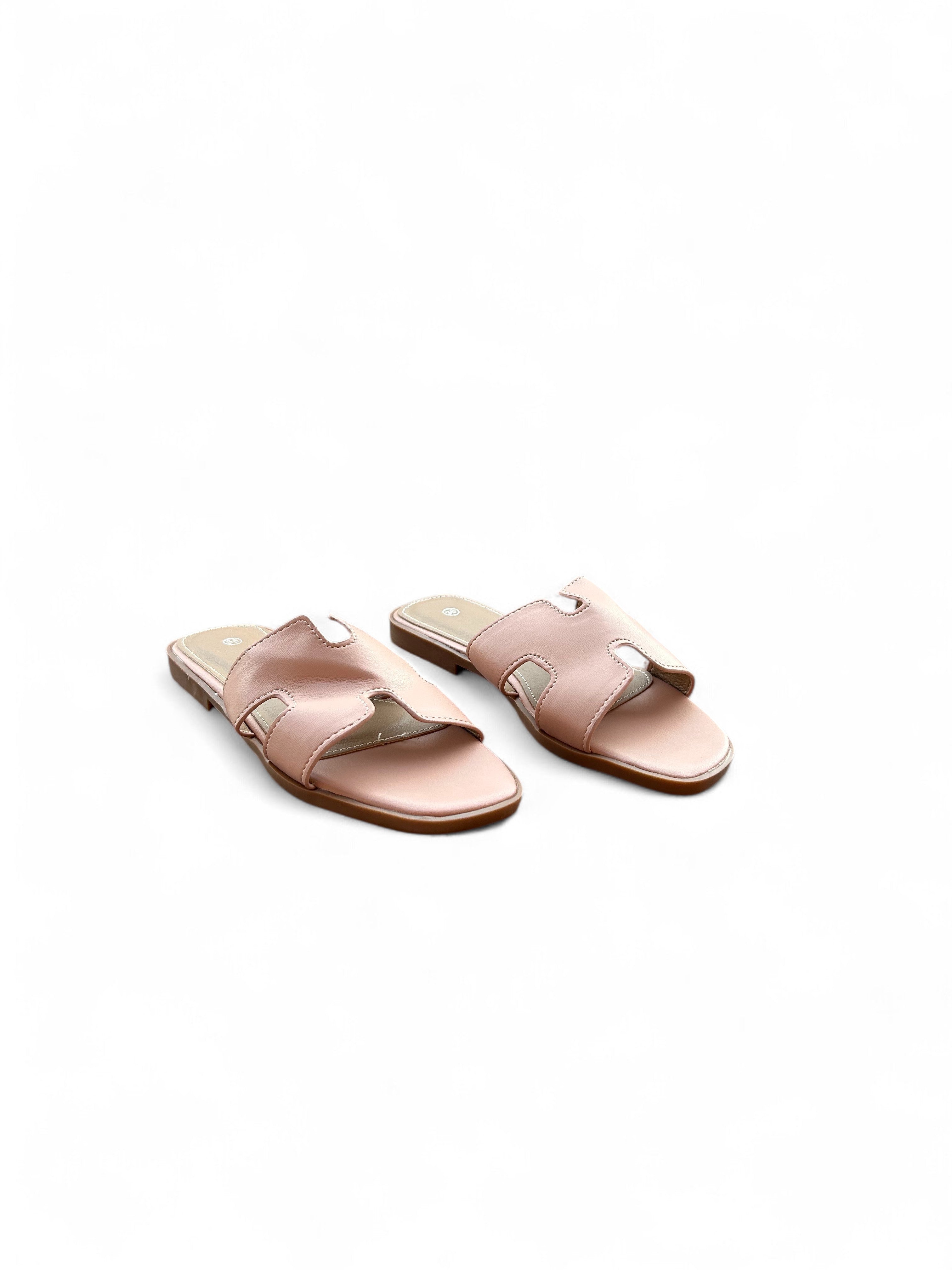 Pink flat slippers