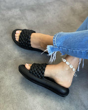 Black flat slippers